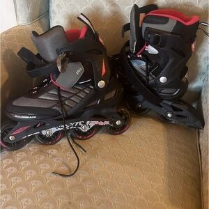 Woman’s rollerblades size9-10 pink and Black excellent condition